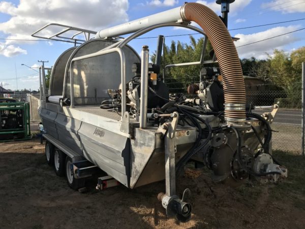 AQUATIC WEED HARVESTER BOAT ON TRI AXLE TRAILER